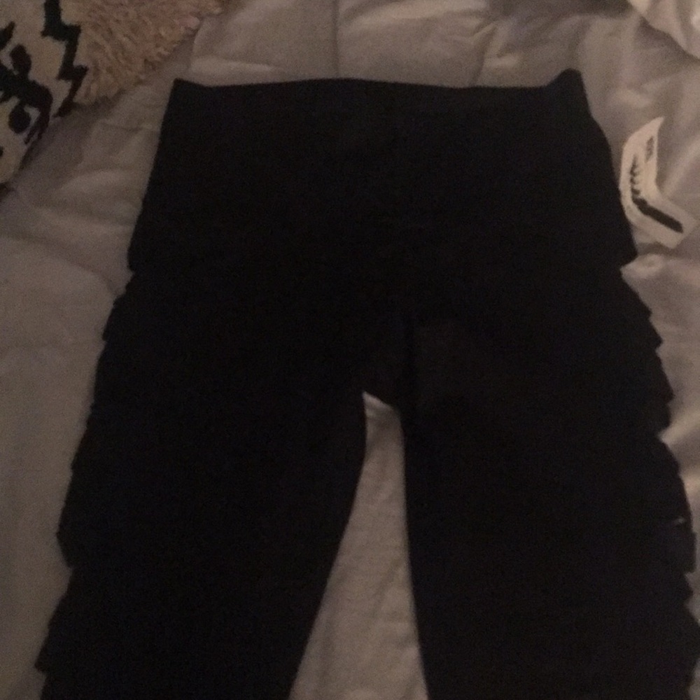 Teekis black skits on side size medium